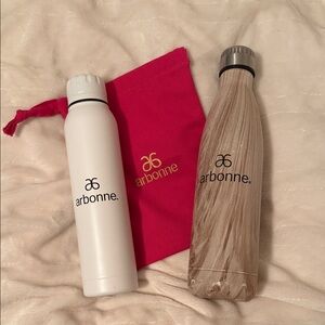 Arbonne White and Wood-Style Bottles with Pink Bag